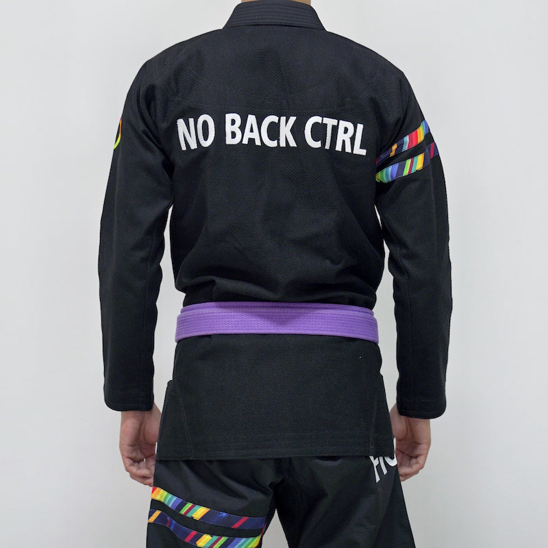 Back view of a model wearing a black rainbow pattern BJJ gi